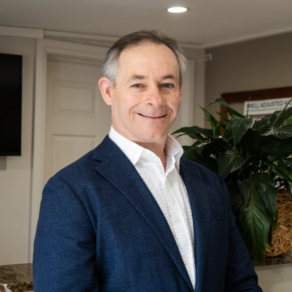 Dr Marcus Chacos, chiropractor and founder of Areté Chiropractic Atelier, in the practice reception.